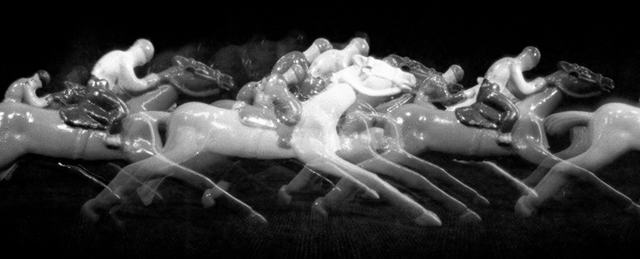 Vintage toy racehorses photographed with a pinhole camera